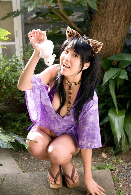 Sexy asian kitten looks incredible in her skin tight leather