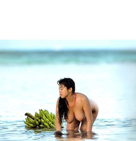 Asian babe strips and shows her curves in the public place