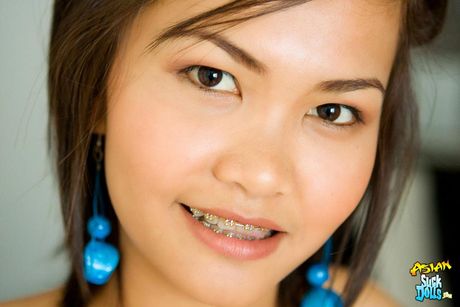 Fa has such a tiny pussy and looks so cute in braces. She shows her body.