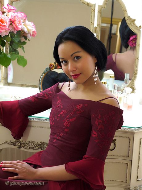 Fantastic Asian babe Petra strips and shows her perfect ass and tits