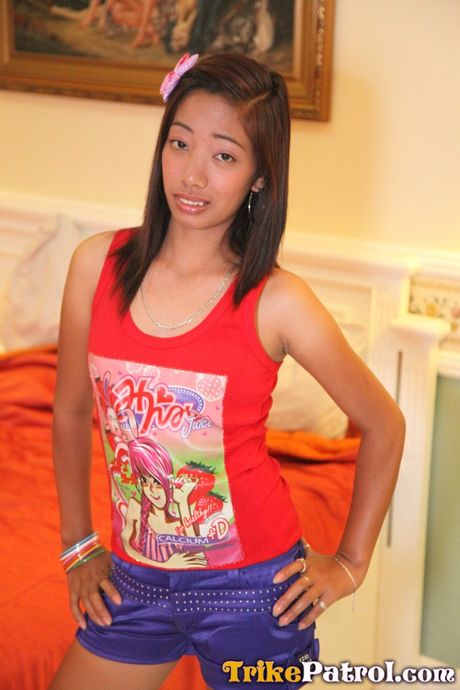 Asian teen Lalaine shows her hairy pussy and small tits in a solo