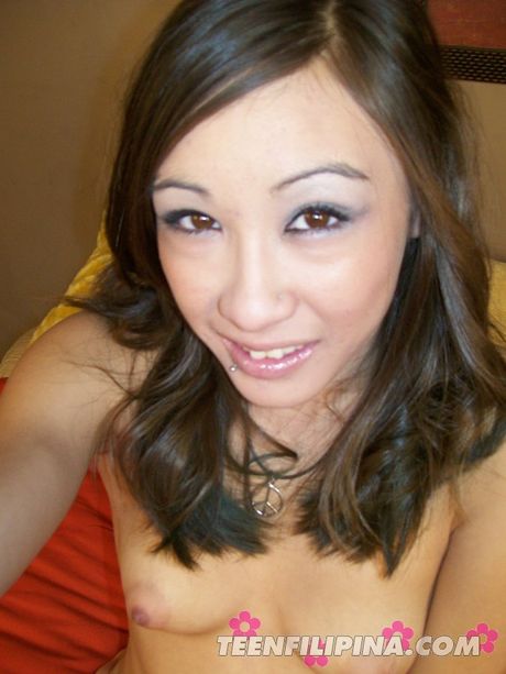 Asian teen amateur girl with tiny tits and pierced nipples gives a blowjob