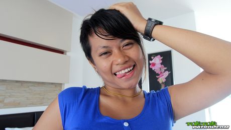 Asian mommy Paw unveils her amazing juggs and toys her pierced pussy