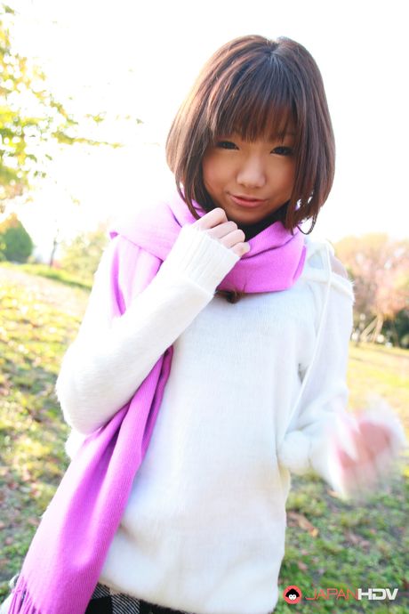 Super cute Japanese teen model Mahiru Tsubaki shows off outdoors