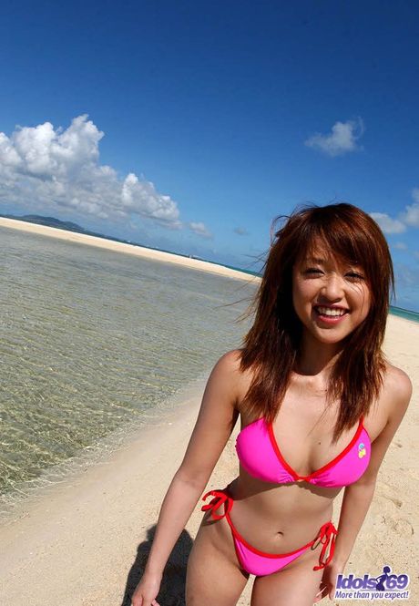 Perfect Japanese babe Haruki strips and shows her tiny tits and ass