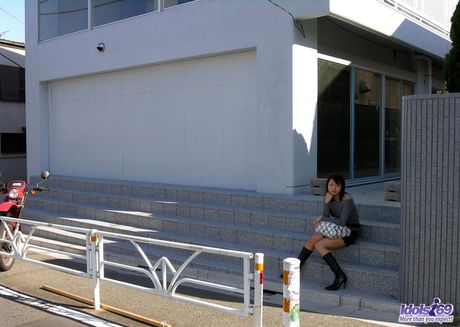 Sexy Asian babe Shiho strips and shows her perfect ass and tits in a solo