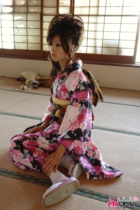 Asian teen Chiaki strips and shows her hairy pussy in a solo