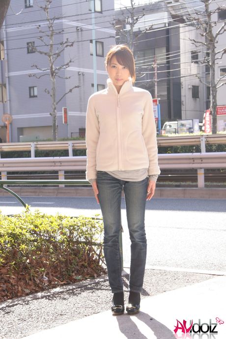 Platinum Japanese babe Mika Ito strips and shows her tiny tits and ass