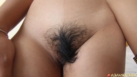 Asian teen Tan gets her hairy pussy licked and dicked by a horny guy