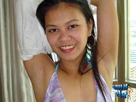 Asian teen with a perfect booty strips and rides a big dick